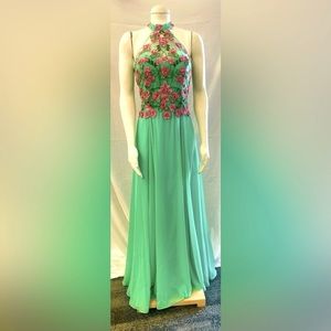 Beautiful pink floral over turquoise dress